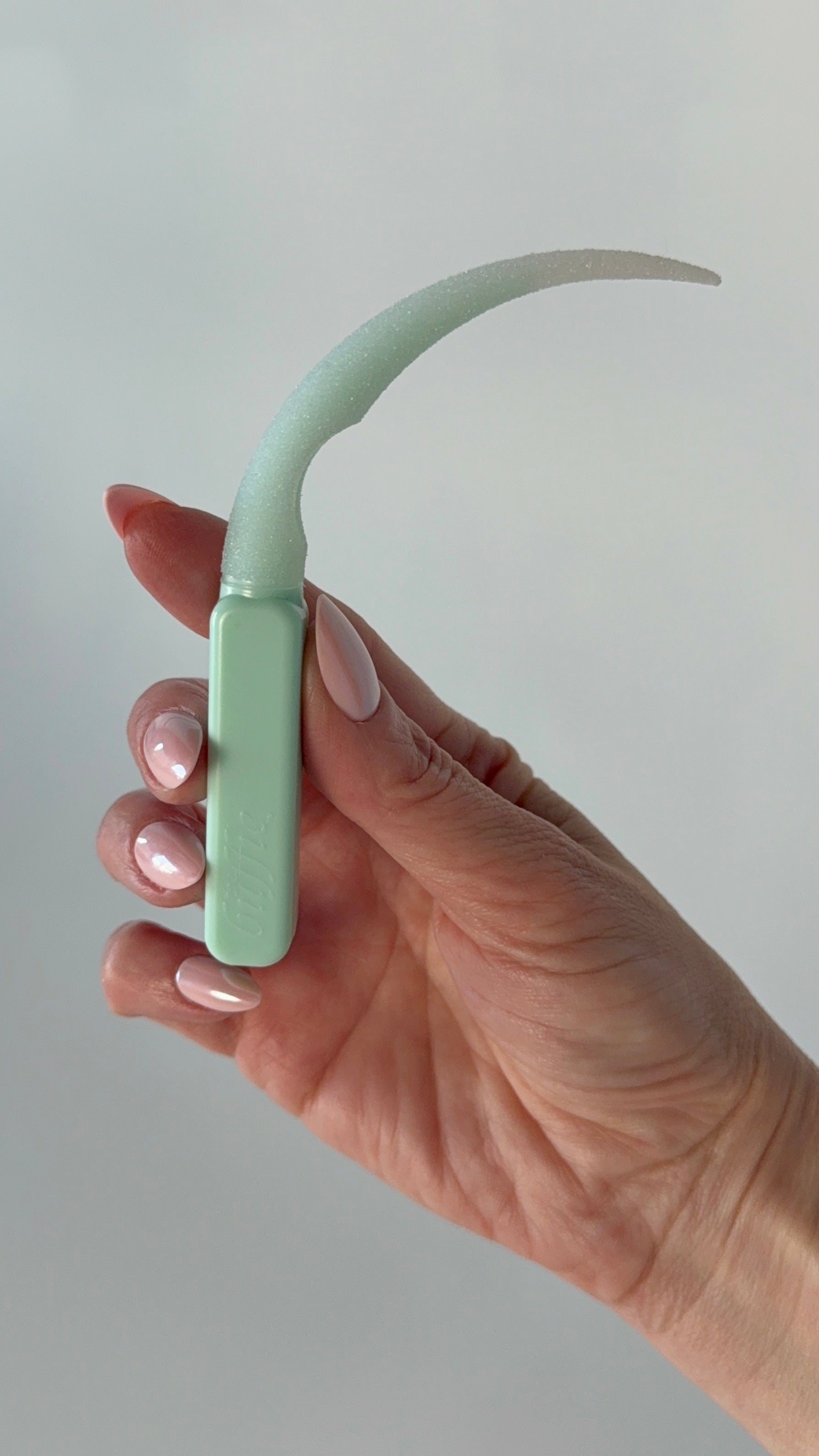 Removing nail glue from press-ons without using acetone